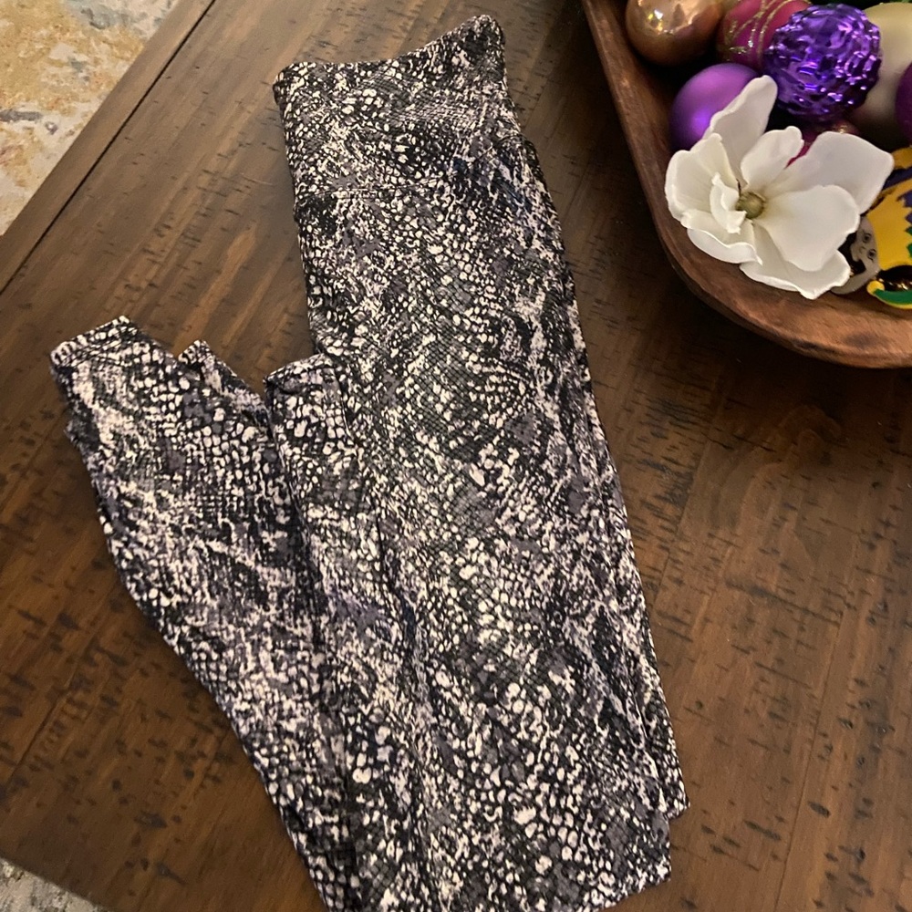 Spanx Faux Leather Snake Shine Leggings in a grey and black snake print